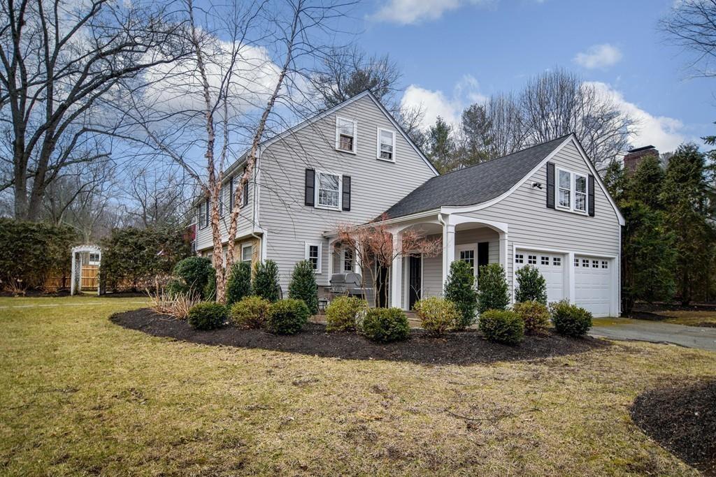 8 Fiske Road Wellesley, MA 02481 - Photo 17 of 21 a front view of a house with a yard and trees
