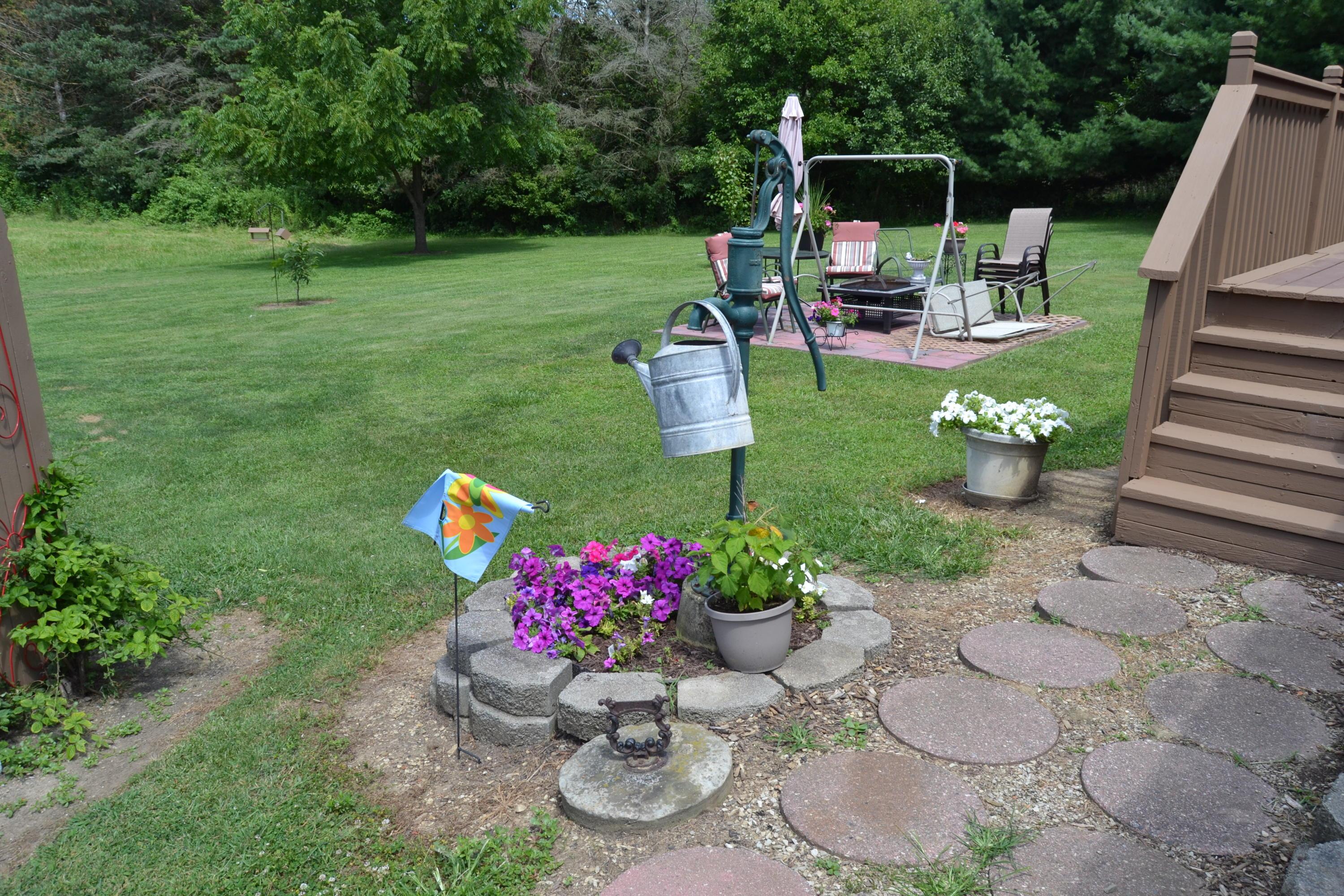 9000 Welsh Road Radnor, OH 43066 - Photo 19 of 28 Landscape stepping stones lead out to the yard.