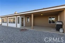 a kitchen with a stove a sink and a refrigerator