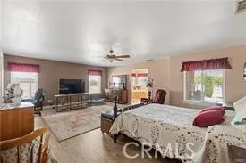 a bathroom with a sink vanity mirror and tub