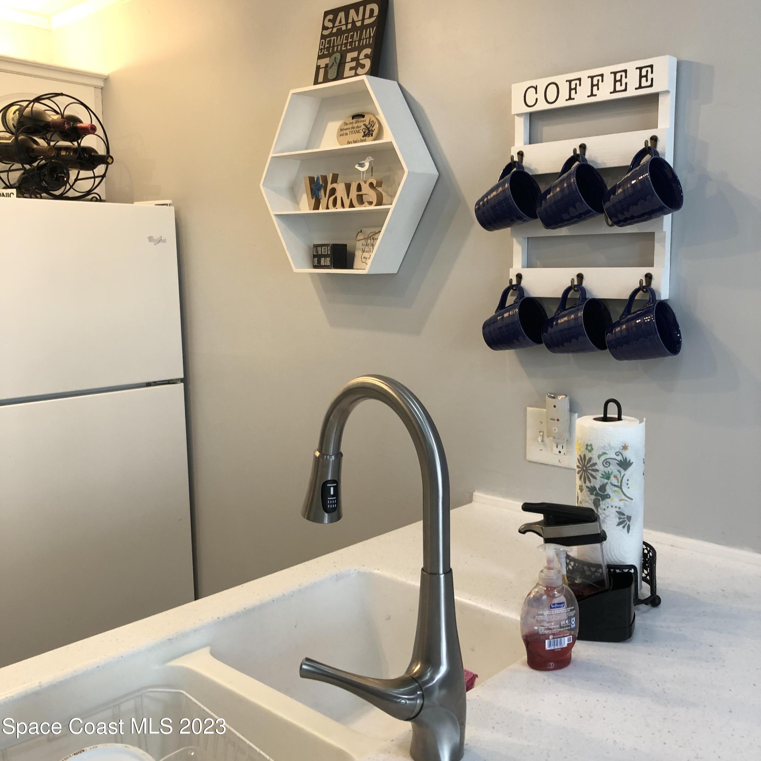 2020 North Atlantic Avenue, Unit 408S Cocoa Beach, FL 32931 - Photo 10 of 22 a bathroom with a bathtub and a sink