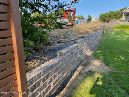 a view of a backyard of a house