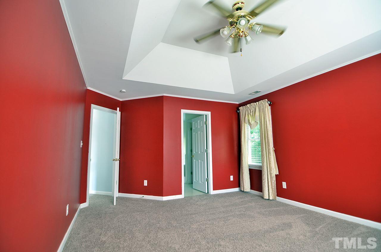 6000 Bunchberry Court Raleigh, NC 27616 - Photo 15 of 25 an empty room with windows and closet