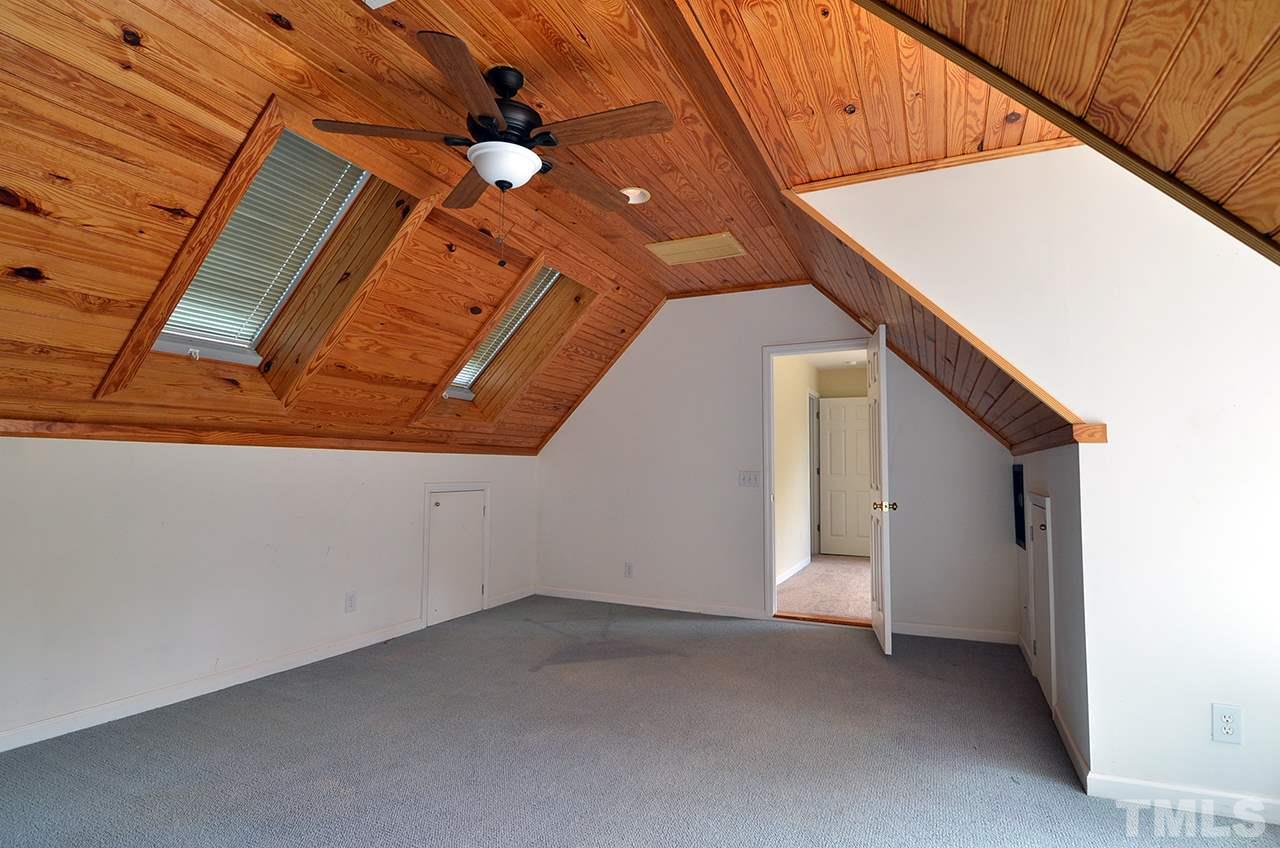 6000 Bunchberry Court Raleigh, NC 27616 - Photo 19 of 25 a view of an empty room with a ceiling fan