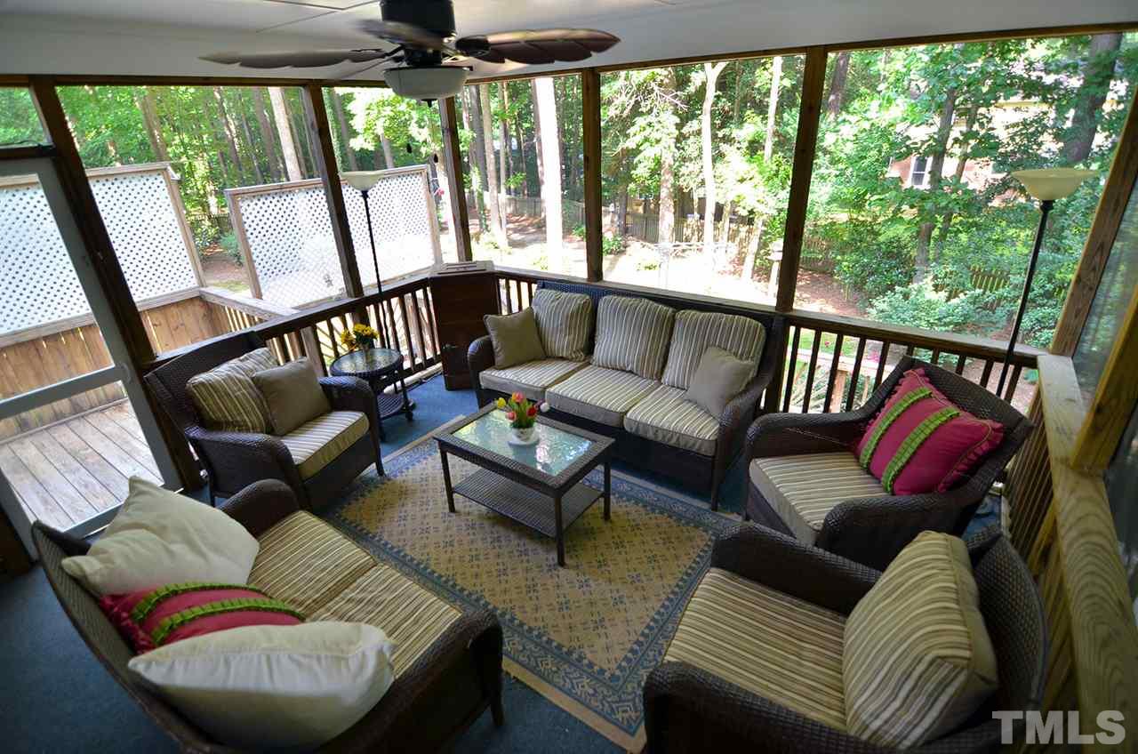 6000 Bunchberry Court Raleigh, NC 27616 - Photo 21 of 25 a living room with furniture and a large window
