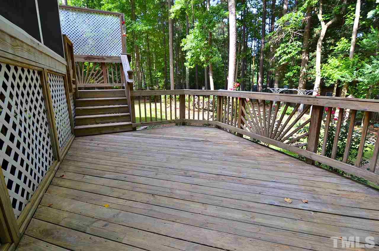 6000 Bunchberry Court Raleigh, NC 27616 - Photo 23 of 25 a view of a wooden deck