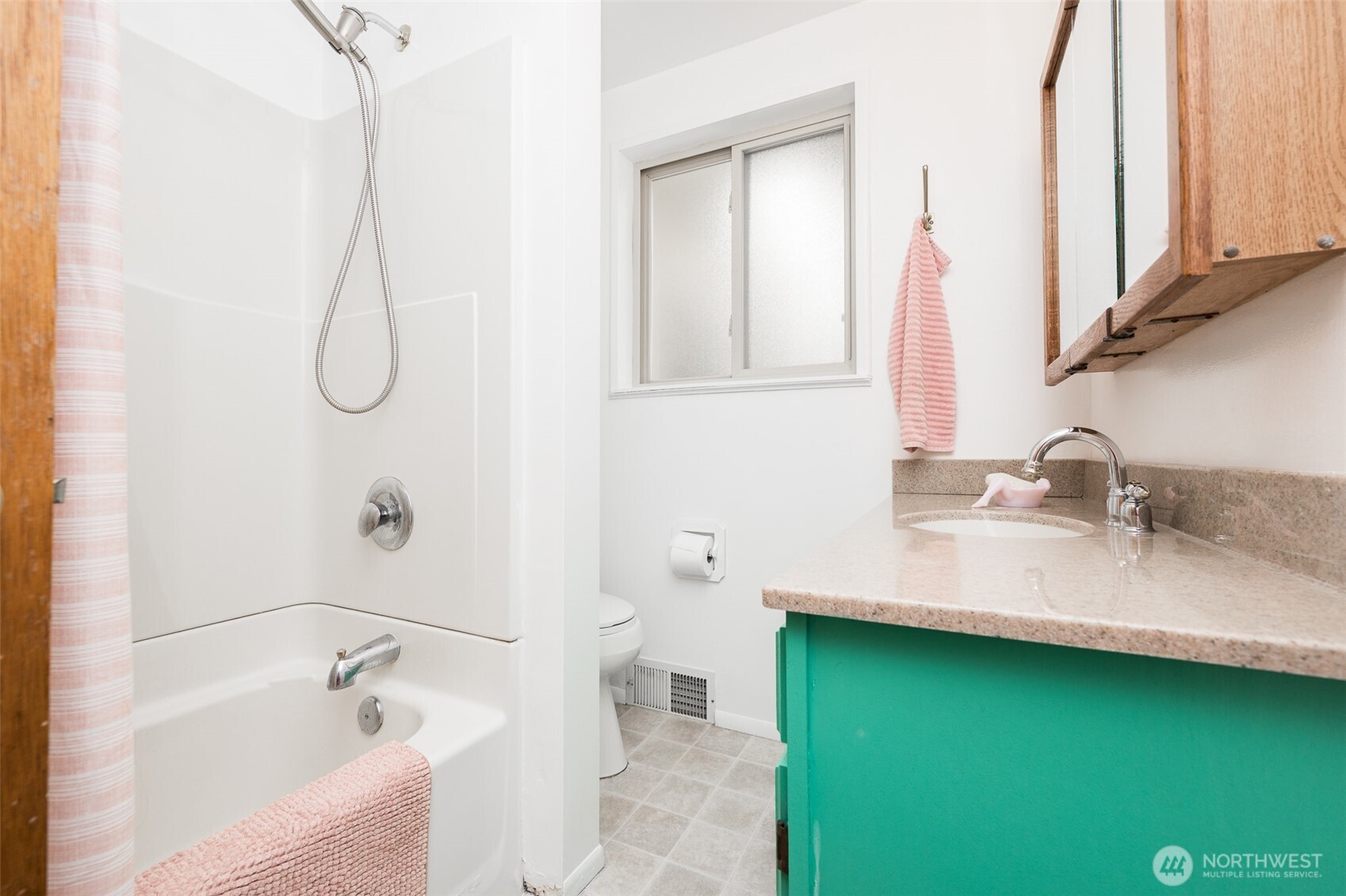 9116 121st Street Southwest Lakewood, WA 98498 - Photo 13 of 24 a bathroom with a sink and a bathtub