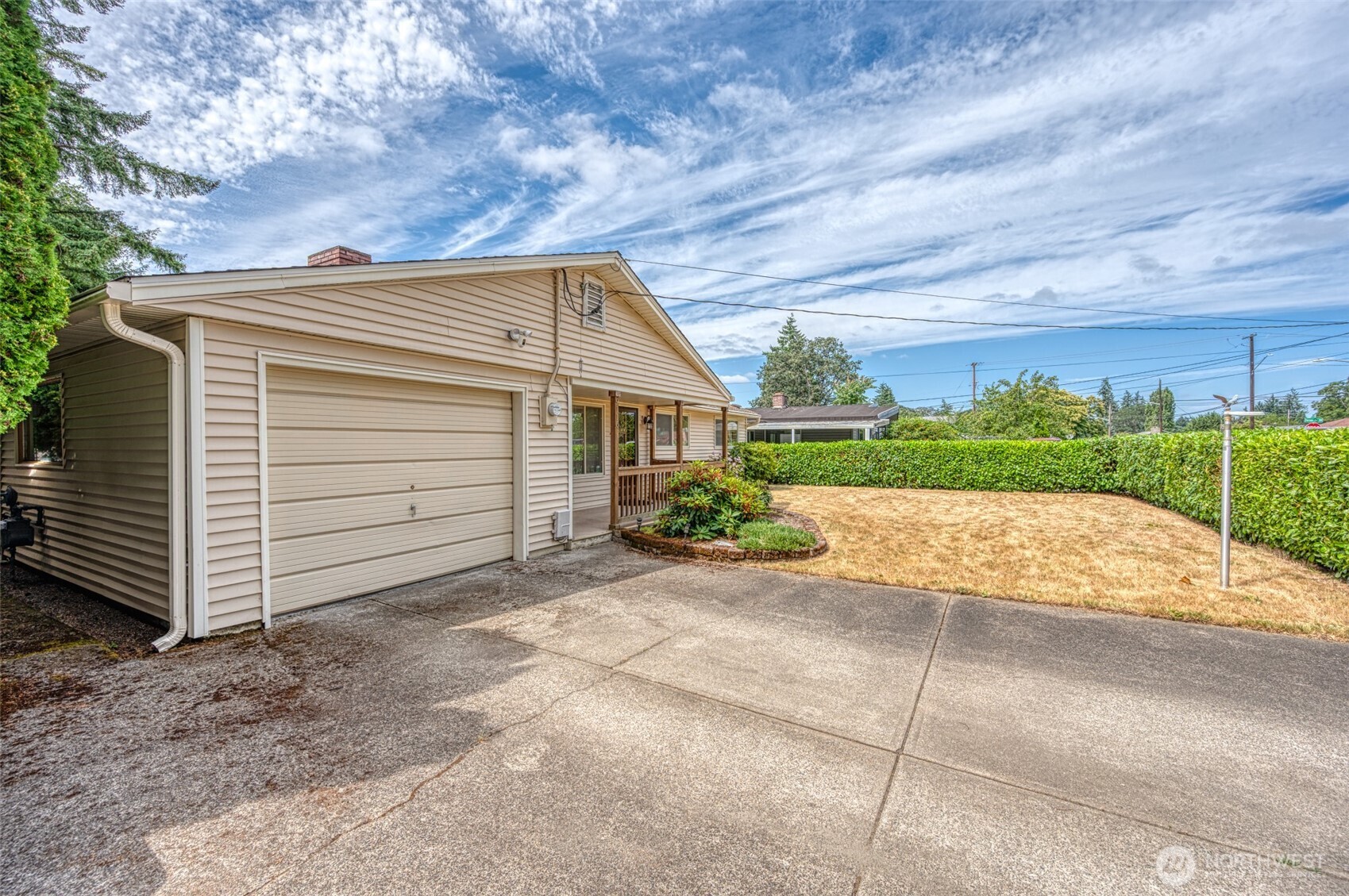 9116 121st Street Southwest Lakewood, WA 98498 - Photo 16 of 24 a view of a house with a yard