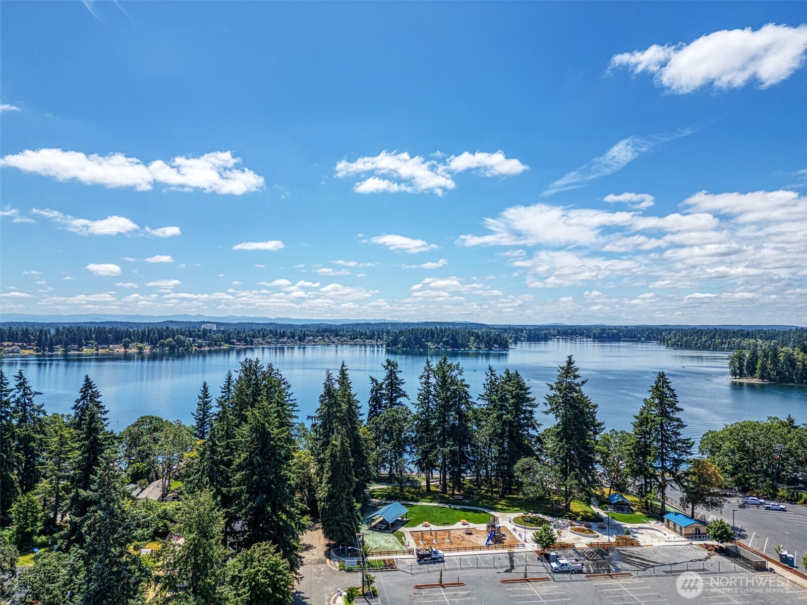 9116 121st Street Southwest Lakewood, WA 98498 - Photo 3 of 24 a view of lake with houses