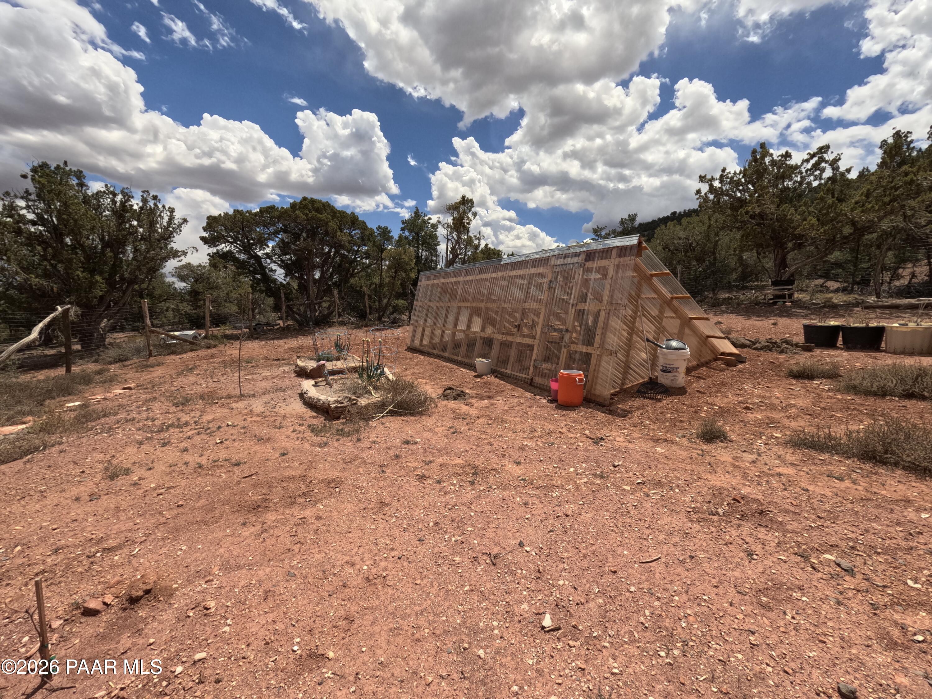 33867 West Whiskey River Road Seligman, AZ 86337 - Photo 41 of 50 Fenced Garden area with Walipini