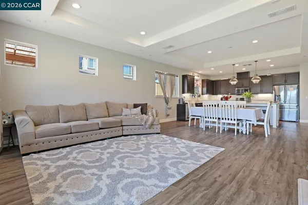 a spacious bedroom with a large bed and a fireplace