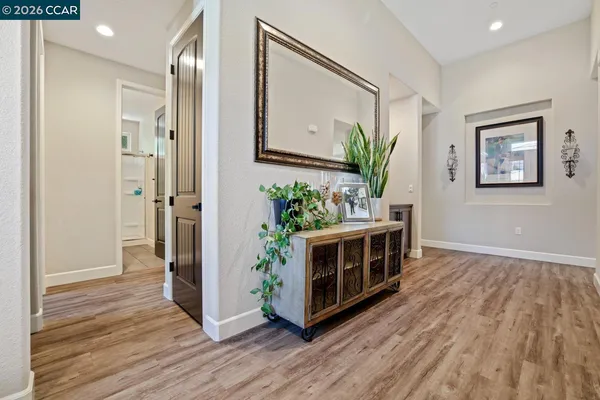 a kitchen with stainless steel appliances a stove and a refrigerator