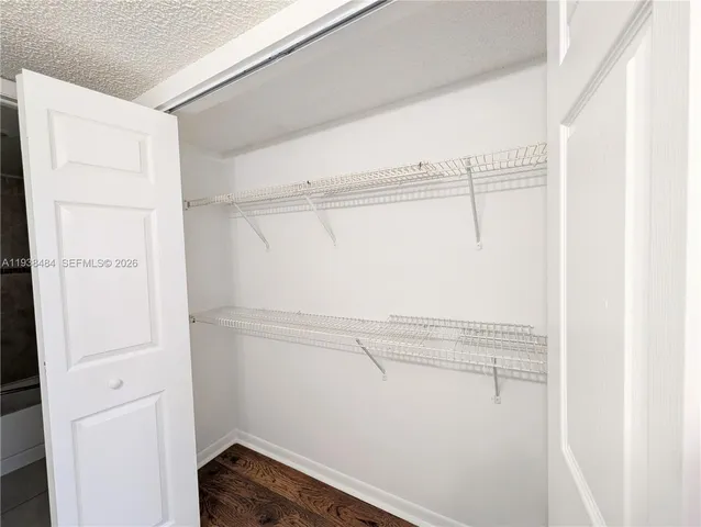 a view of small space with racks on the wall