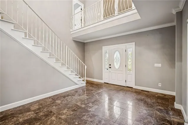 wooden floor in an empty room with a fireplace