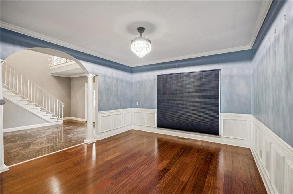 181 Granny Smith Circle Clarkesville, GA 30523 - Photo 13 of 79 a view of an empty room with wooden floor