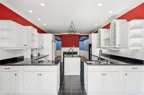 a spacious bathroom with a double vanity sink mirror and
