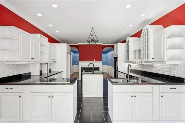 a spacious bathroom with a double vanity sink mirror and