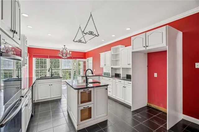 a living room with a fireplace a large window and a fireplace