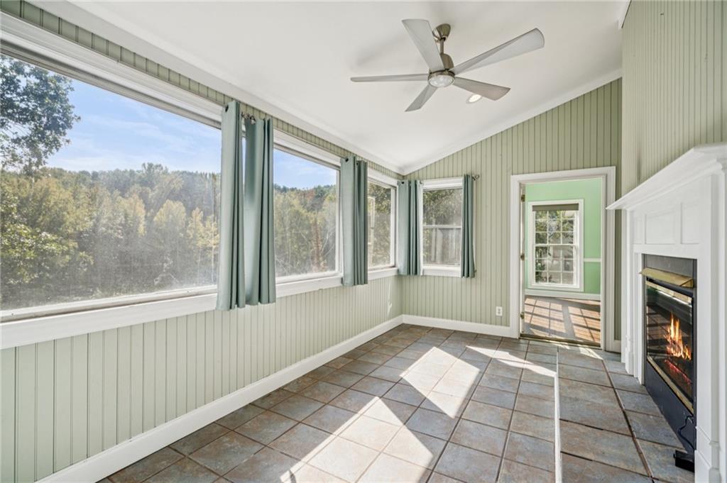 181 Granny Smith Circle Clarkesville, GA 30523 - Photo 28 of 79 a view of livingroom with furniture fan and window