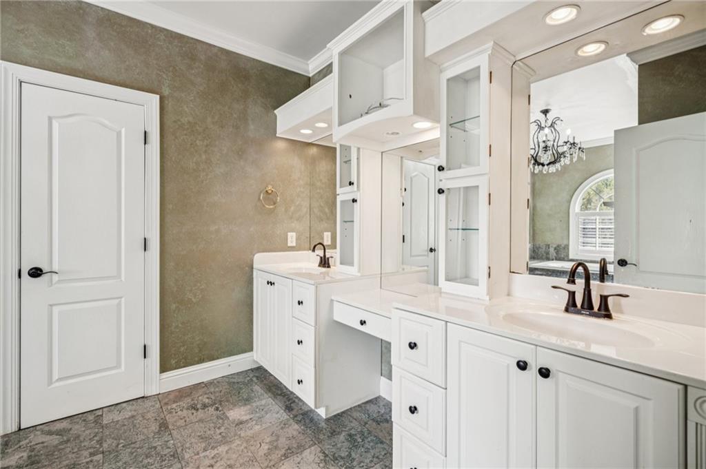 181 Granny Smith Circle Clarkesville, GA 30523 - Photo 31 of 79 a spacious bathroom with a double vanity sink mirror and