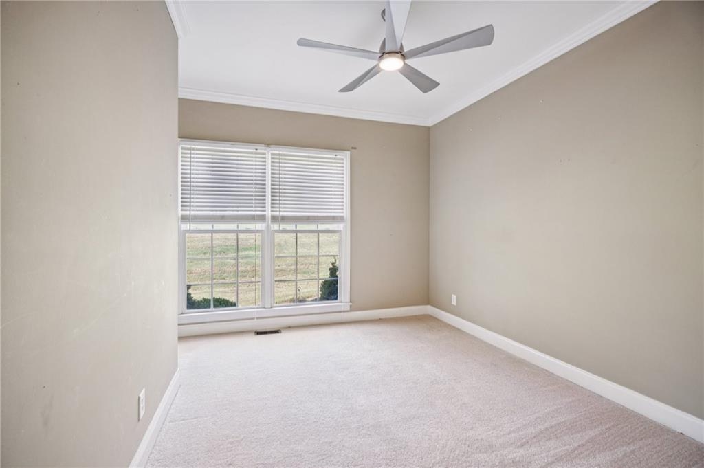 181 Granny Smith Circle Clarkesville, GA 30523 - Photo 34 of 79 an empty room with a empty space and windows