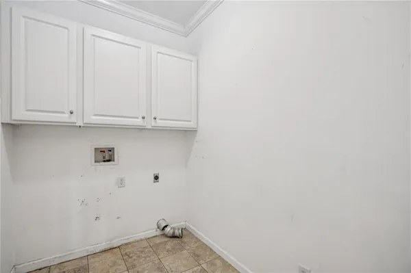 a view of empty room with windows