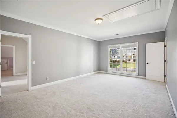 a kitchen with granite countertop a sink and cabinets