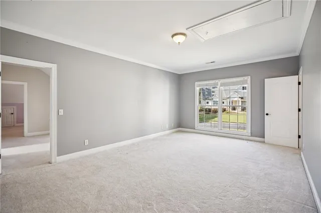 a kitchen with granite countertop a sink and cabinets