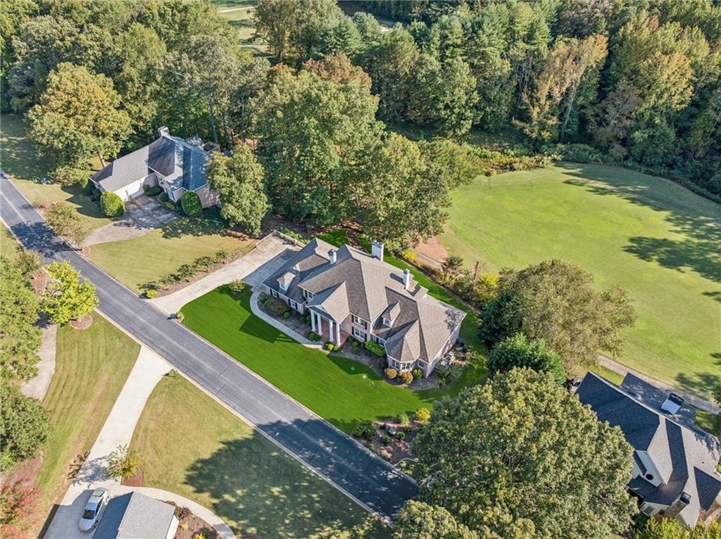 181 Granny Smith Circle Clarkesville, GA 30523 - Photo 5 of 79 an aerial view of a house with a garden