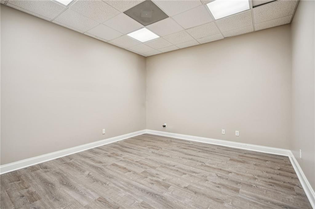 181 Granny Smith Circle Clarkesville, GA 30523 - Photo 60 of 79 a view of an empty room with wooden floor and a window