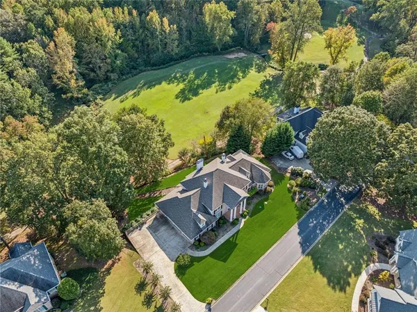 an aerial view of a house with a garden