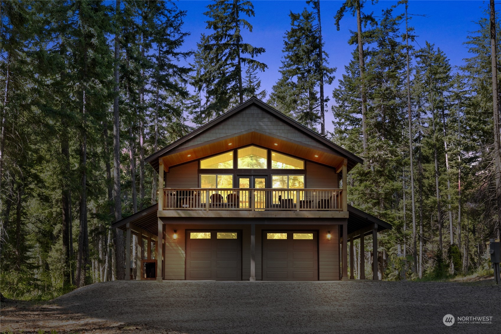 a view of a brick building with large windows