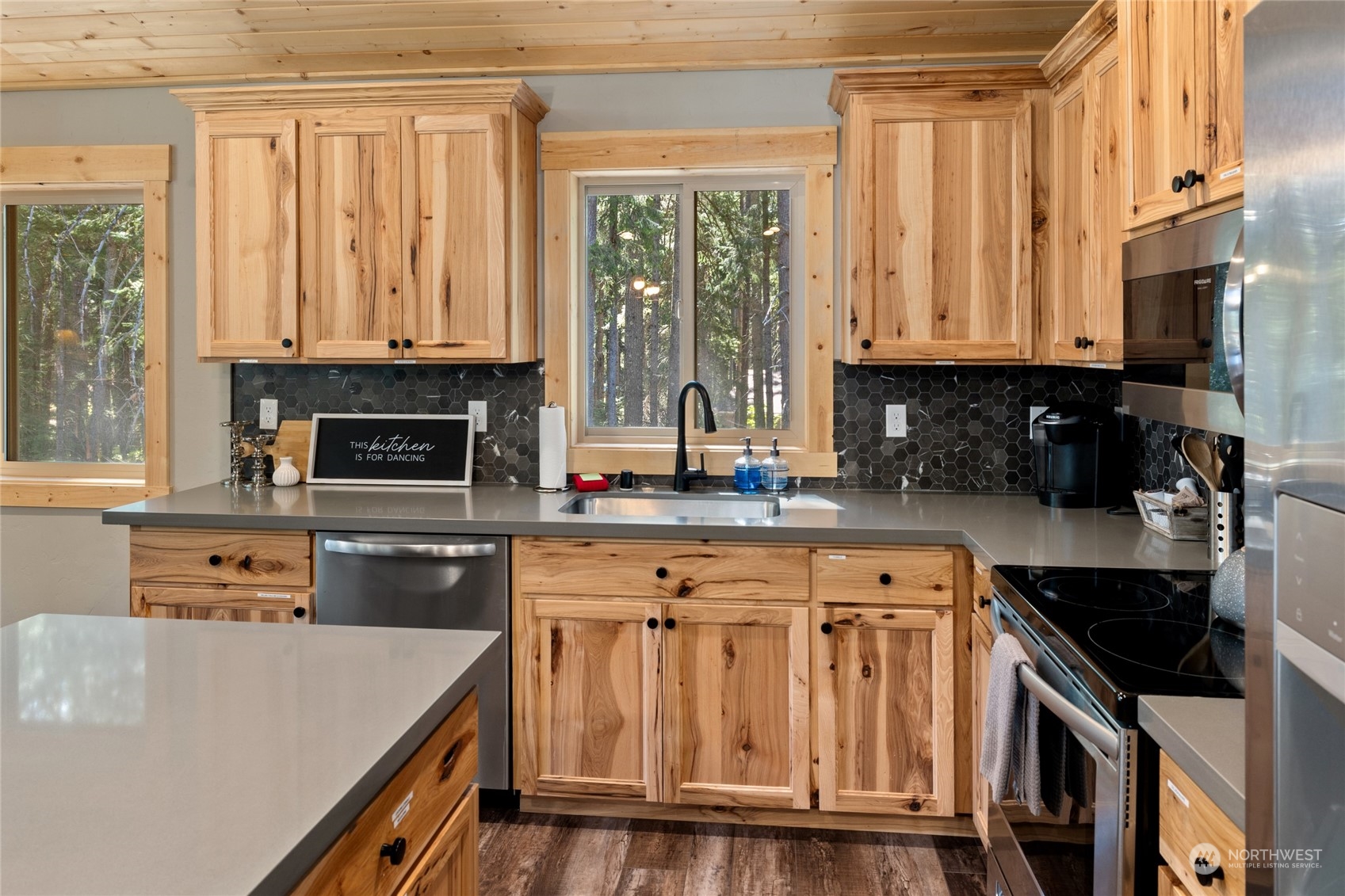 230 Easy Street Ronald, WA 98940 - Photo 12 of 40 a kitchen with stainless steel appliances granite countertop a stove a sink and a microwave