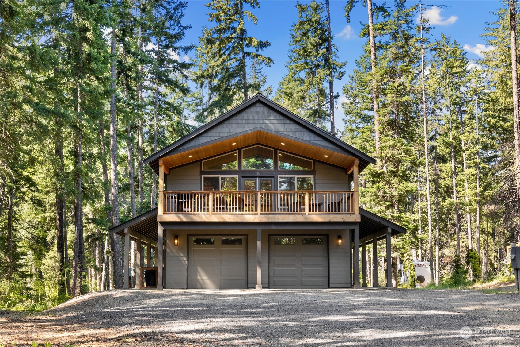 230 Easy Street Ronald, WA 98940 - Photo 2 of 40 a front view of a house with a garden