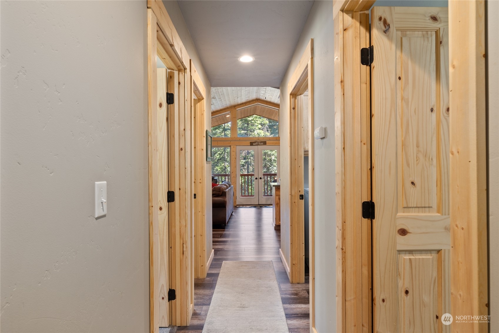 230 Easy Street Ronald, WA 98940 - Photo 28 of 40 a view of a hallway with a livingroom and a bathroom with a mirror