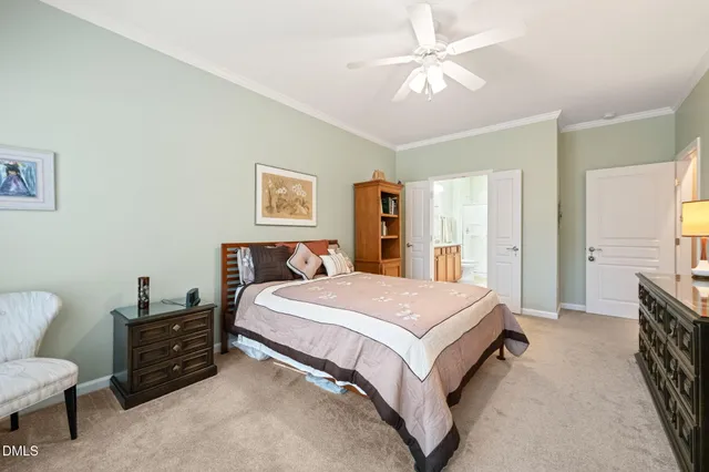 a bathroom with a granite countertop sink a toilet a mirror and shower