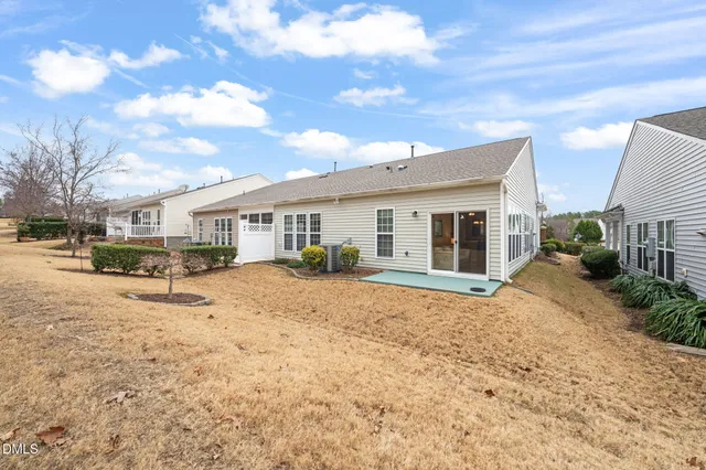 a house with yard in front of it