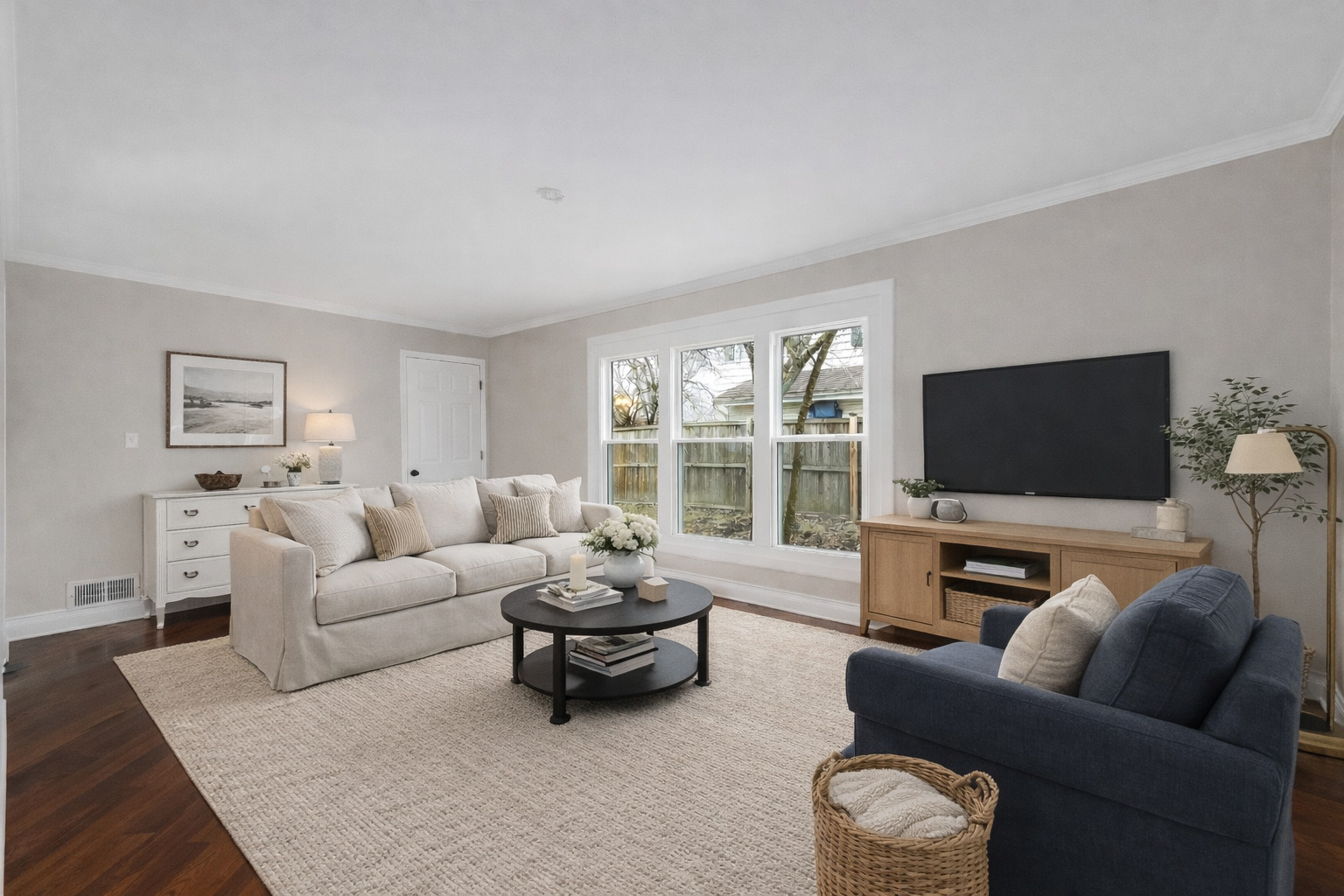7804 Rohrer Drive Downers Grove, IL 60516 - Photo 11 of 28 a living room with furniture and a flat screen tv