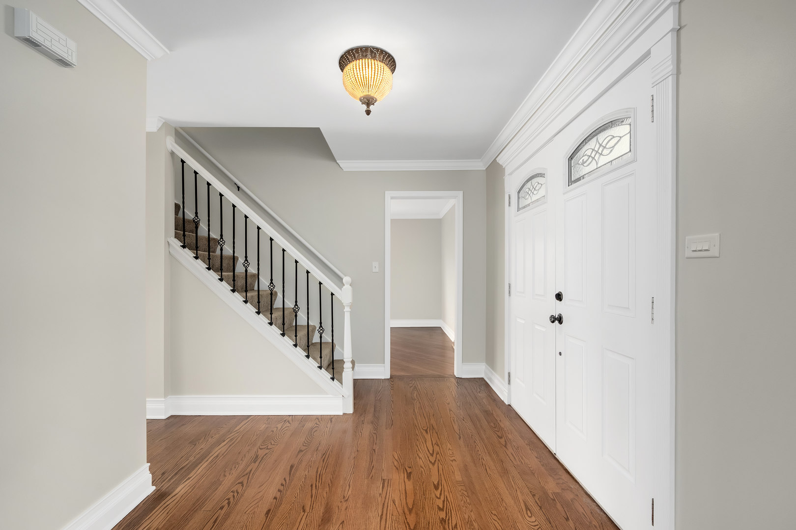 7804 Rohrer Drive Downers Grove, IL 60516 - Photo 13 of 28 a view of a hallway with wooden floor
