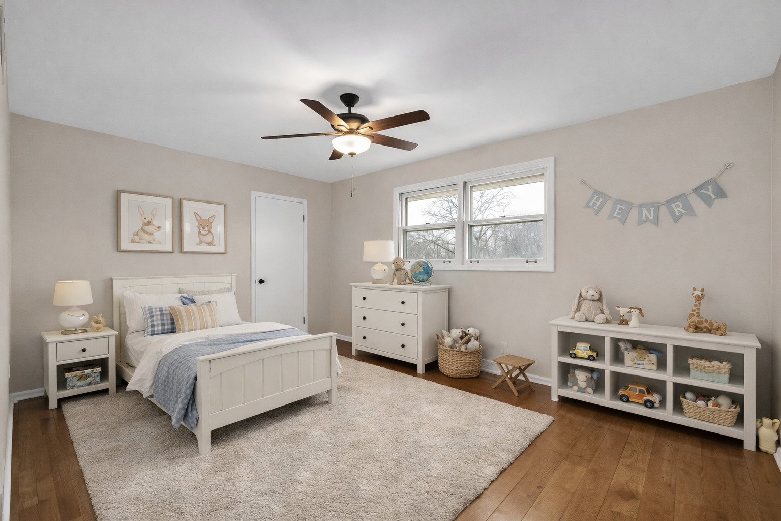 7804 Rohrer Drive Downers Grove, IL 60516 - Photo 15 of 28 a spacious bedroom with a bed and a table in it