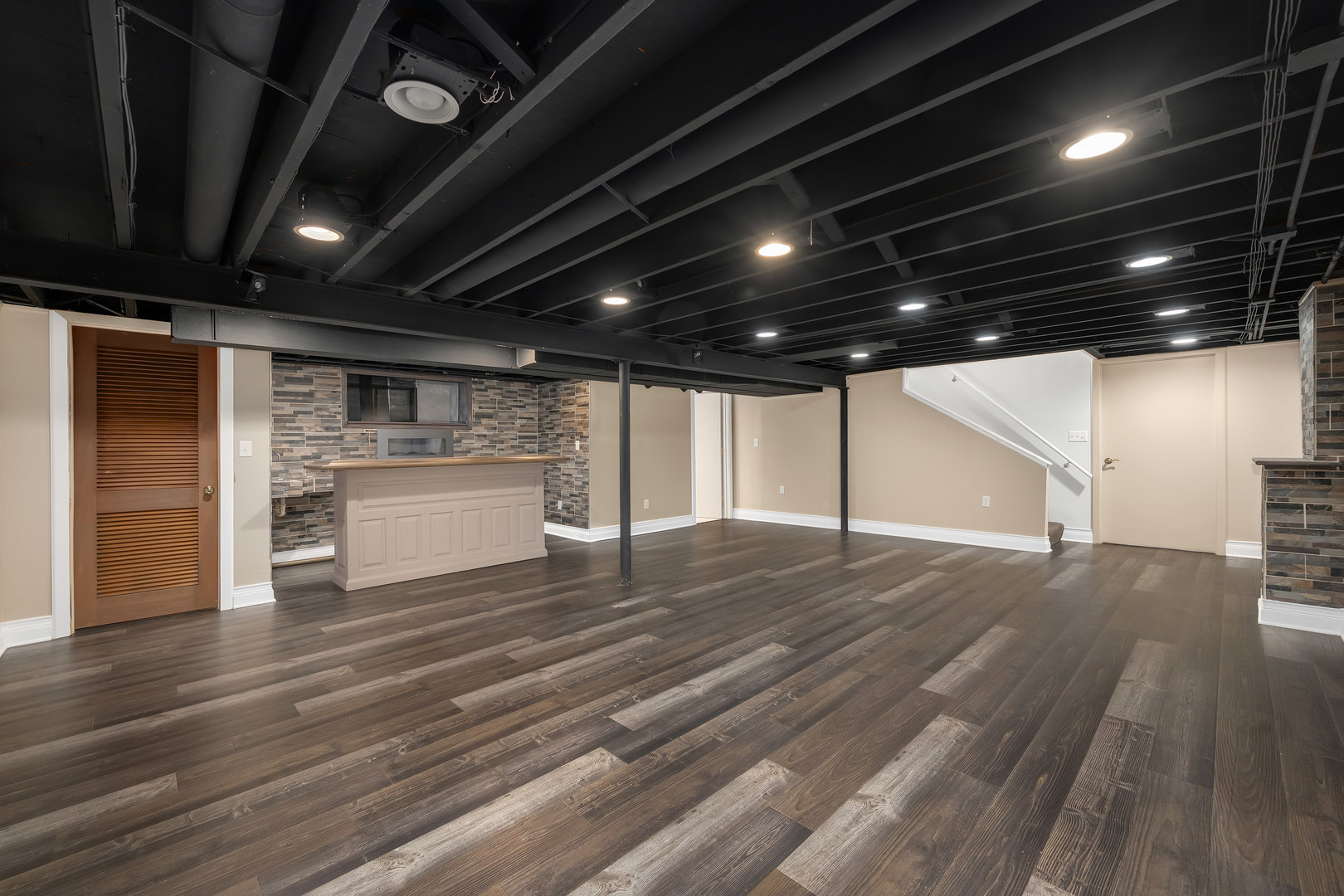 7804 Rohrer Drive Downers Grove, IL 60516 - Photo 21 of 28 a view of an empty room with wooden floor