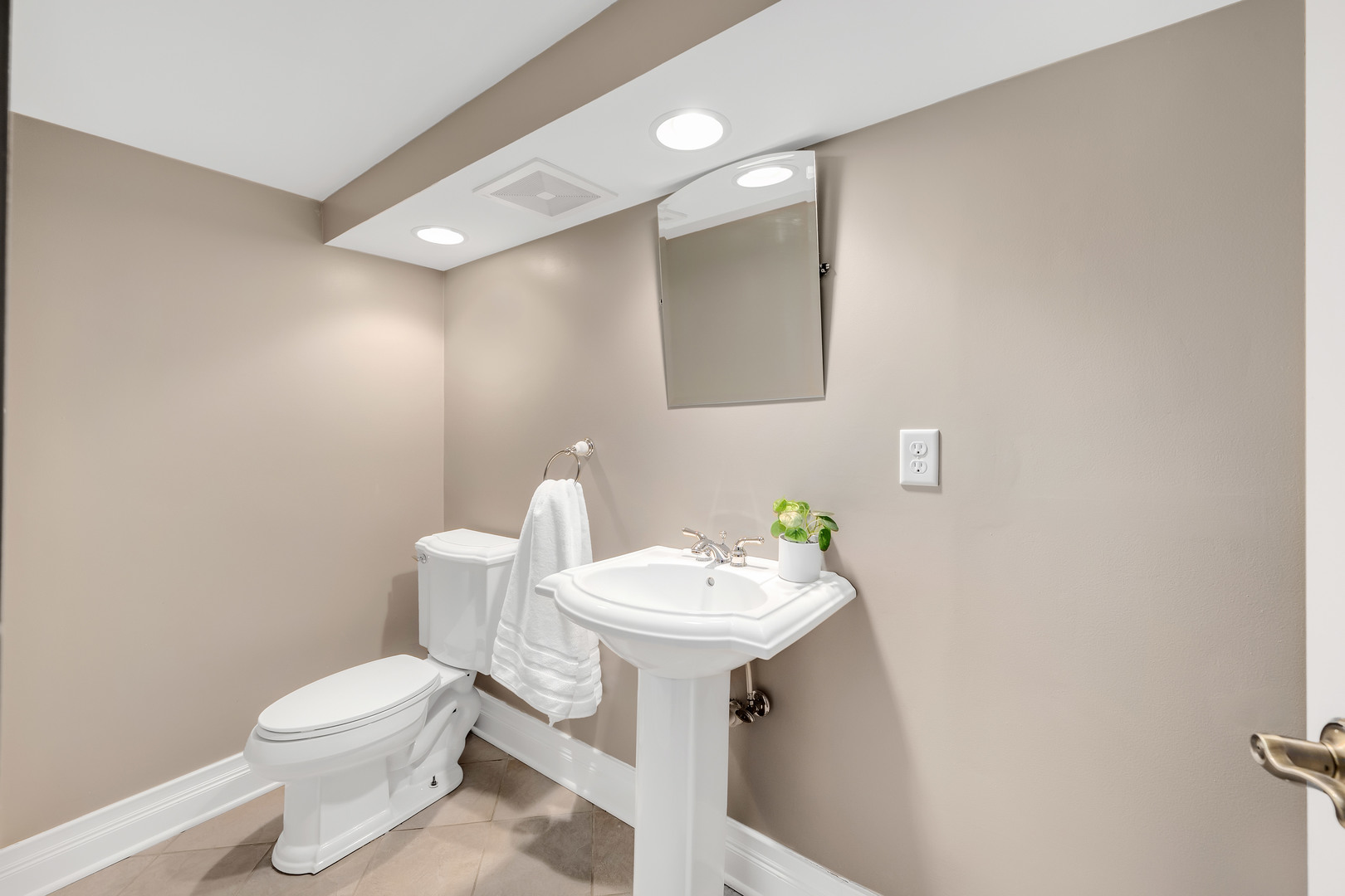 7804 Rohrer Drive Downers Grove, IL 60516 - Photo 23 of 28 a bathroom with a sink and a toilet