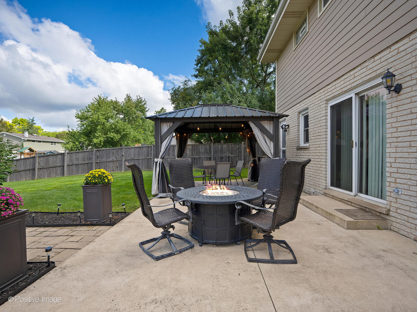 7804 Rohrer Drive Downers Grove, IL 60516 - Photo 24 of 28 a view of backyard with outdoor seating