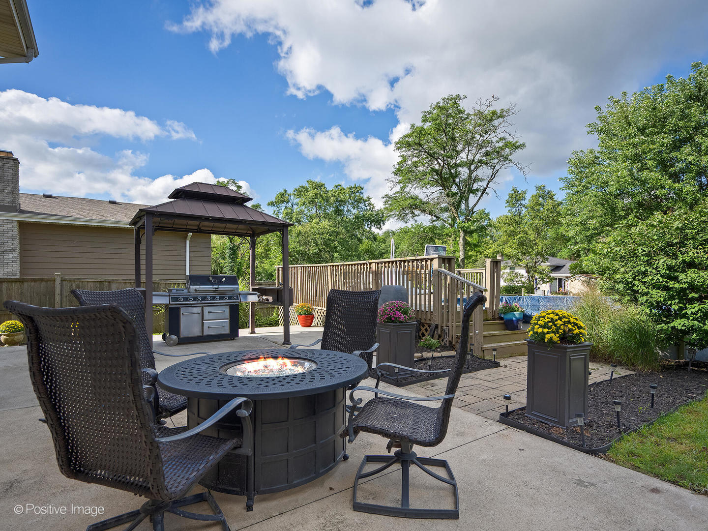 7804 Rohrer Drive Downers Grove, IL 60516 - Photo 25 of 28 a view of a table and chairs in patio