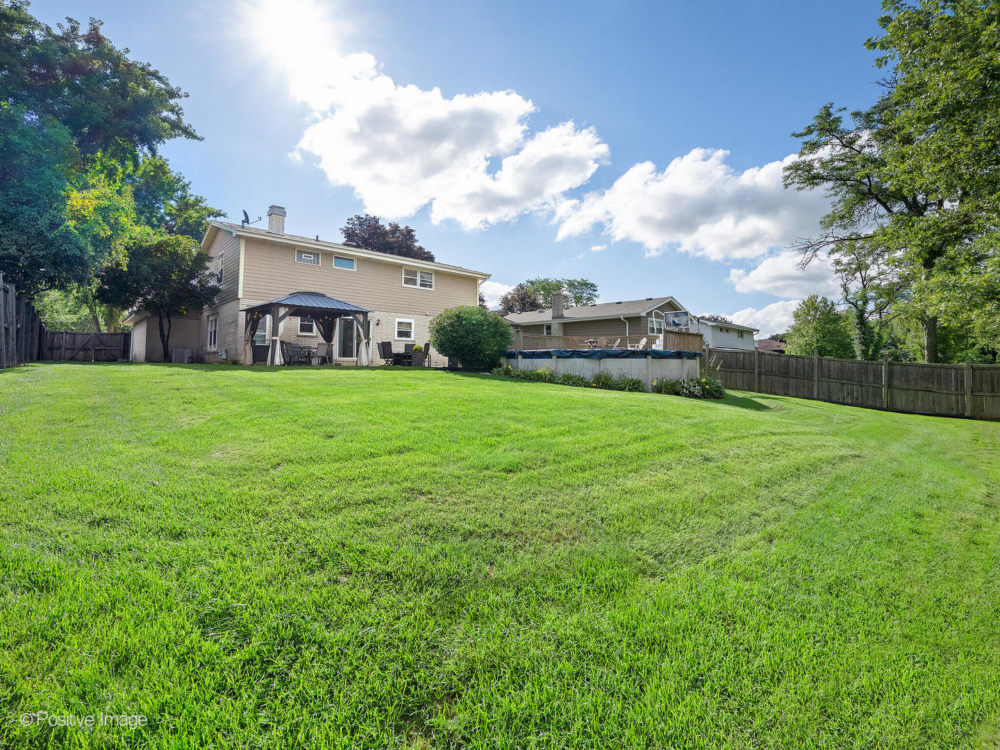 7804 Rohrer Drive Downers Grove, IL 60516 - Photo 28 of 28 a view of a house with a yard and sitting area