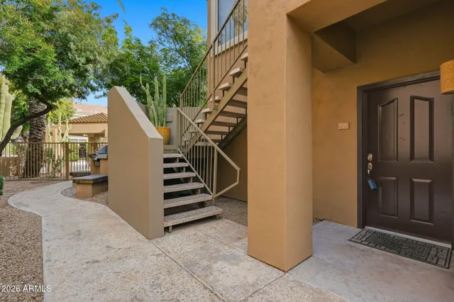 a view of a house with entryway and stairs