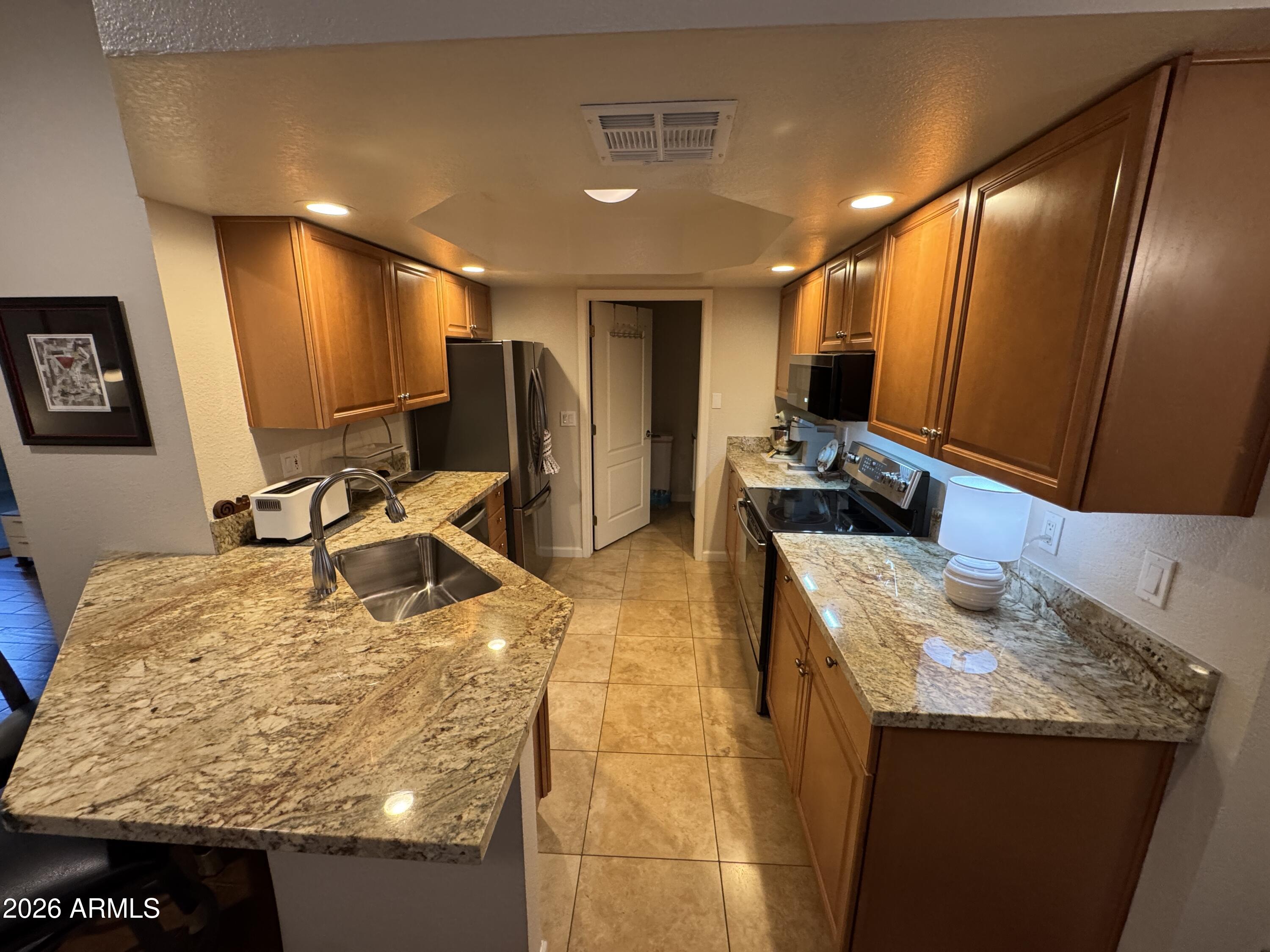 4848 North 36th Street, Unit 129 Phoenix, AZ 85018 - Photo 5 of 16 IMG_4937 2