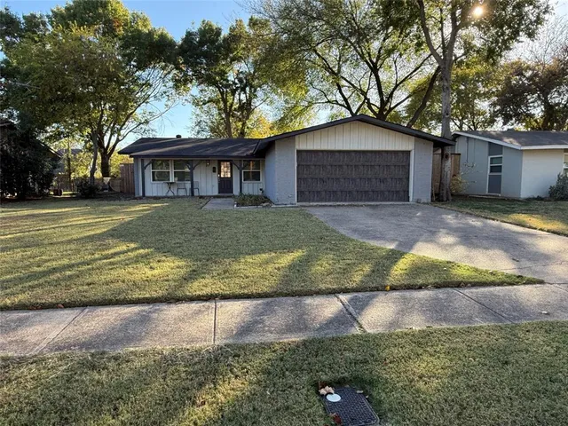 a house view with a garden space