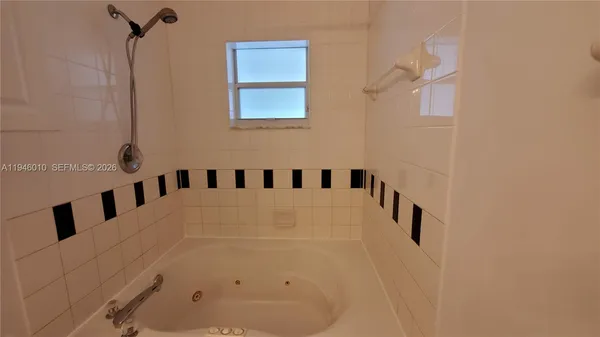 a bathroom with a bathtub