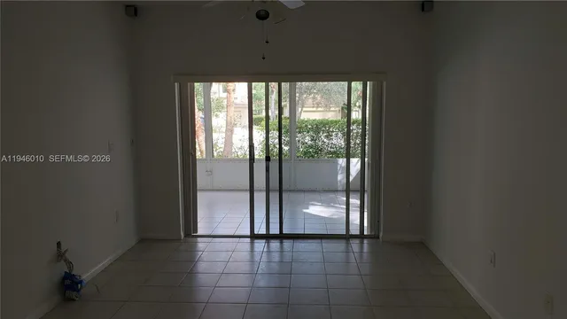 a view of a room with a large window